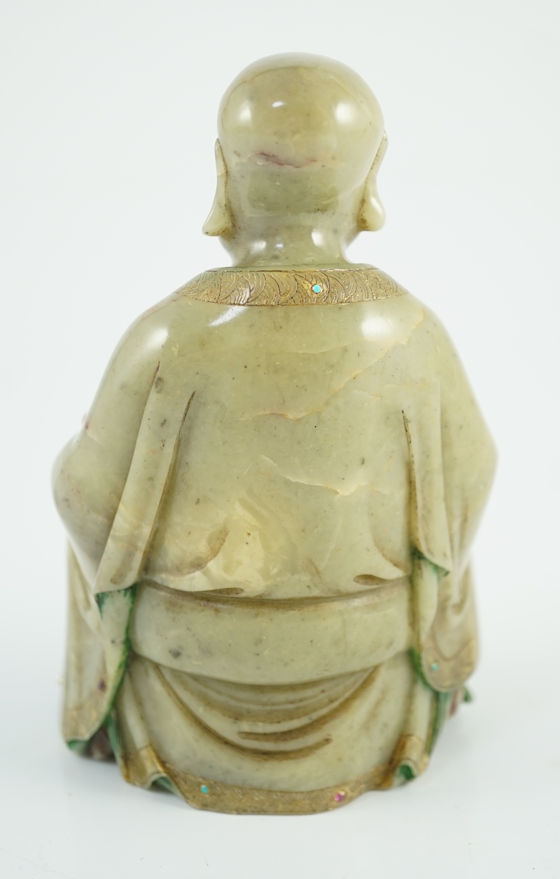 A Chinese soapstone seated figure of a luohan, 18th century, 12.5cm high